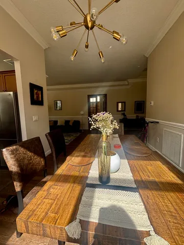 a bedroom with bed and window