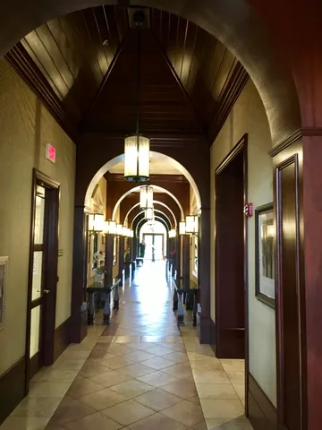 a view of a street with a building in the background