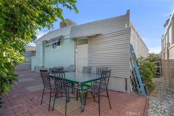 a view of a house with a patio