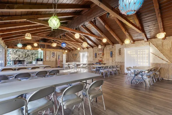 a room with furniture and pool table