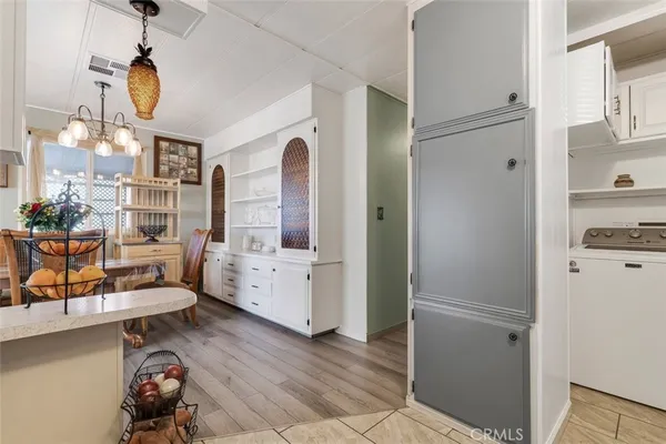 a room with furniture and a window