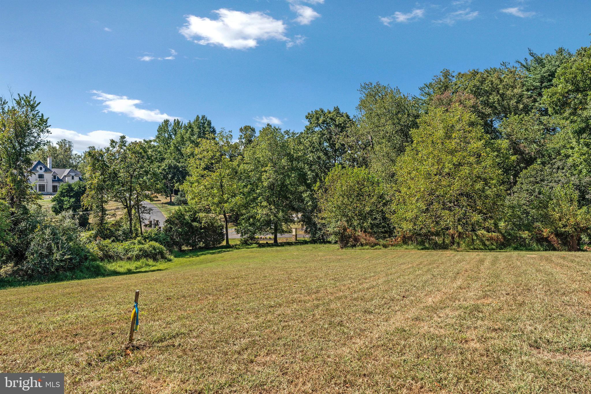 11214 Stuart Mill Road Oakton, VA 22124 - Photo 13 of 26 a view of an outdoor space and a yard