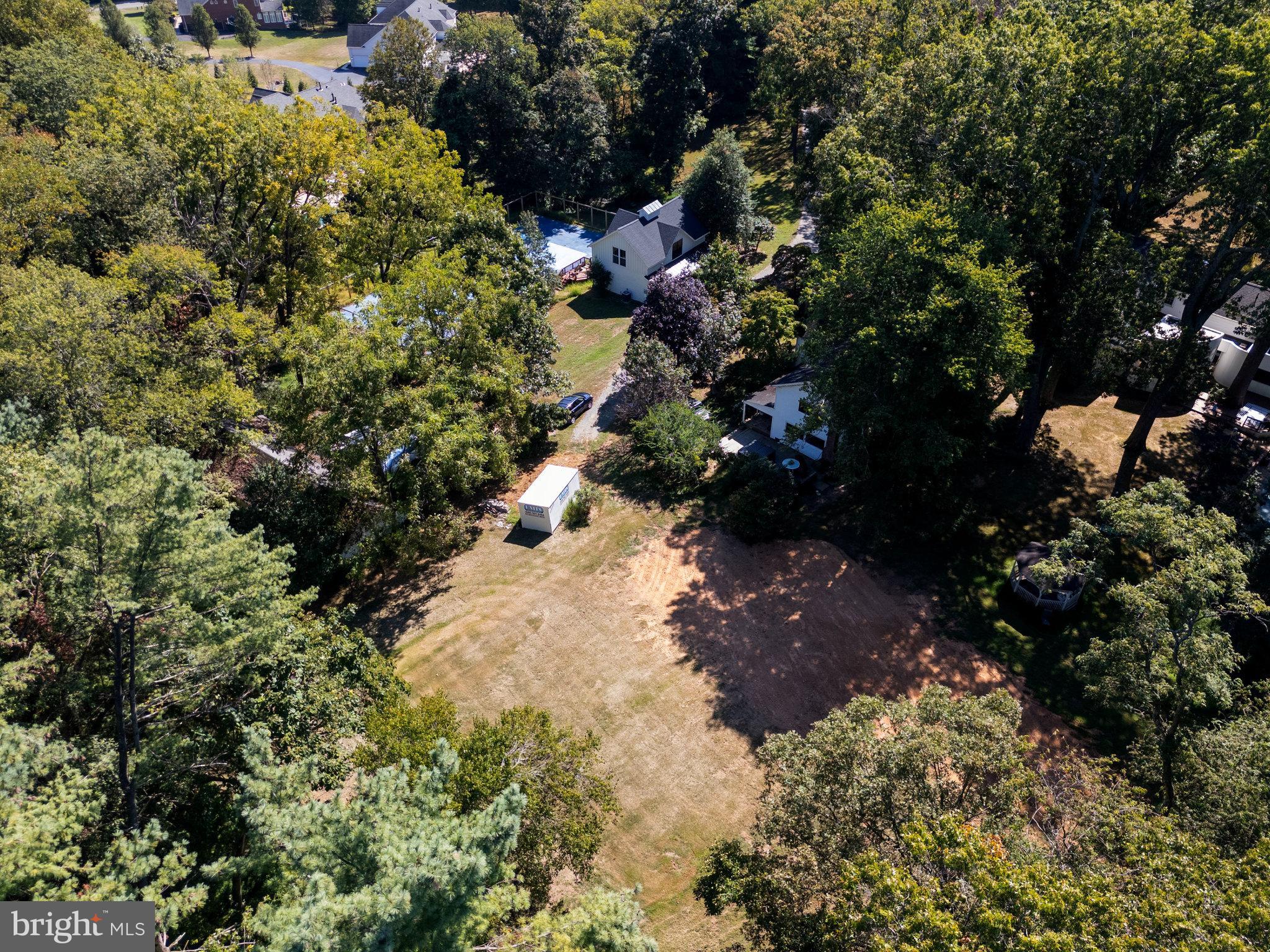 11214 Stuart Mill Road Oakton, VA 22124 - Photo 16 of 26 a view of a tree with a yard