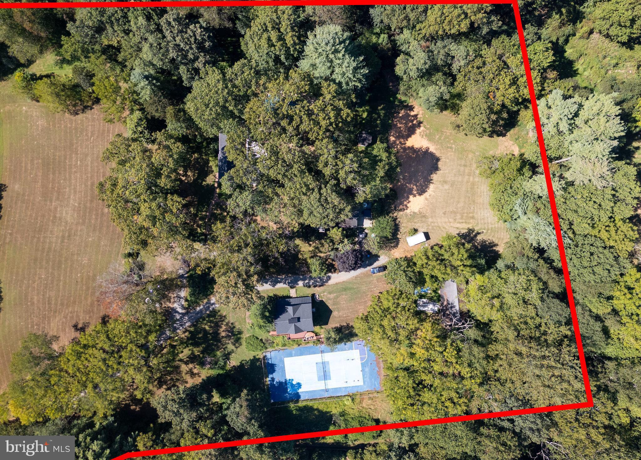 11214 Stuart Mill Road Oakton, VA 22124 - Photo 19 of 26 an aerial view of residential house with outdoor space and trees all around