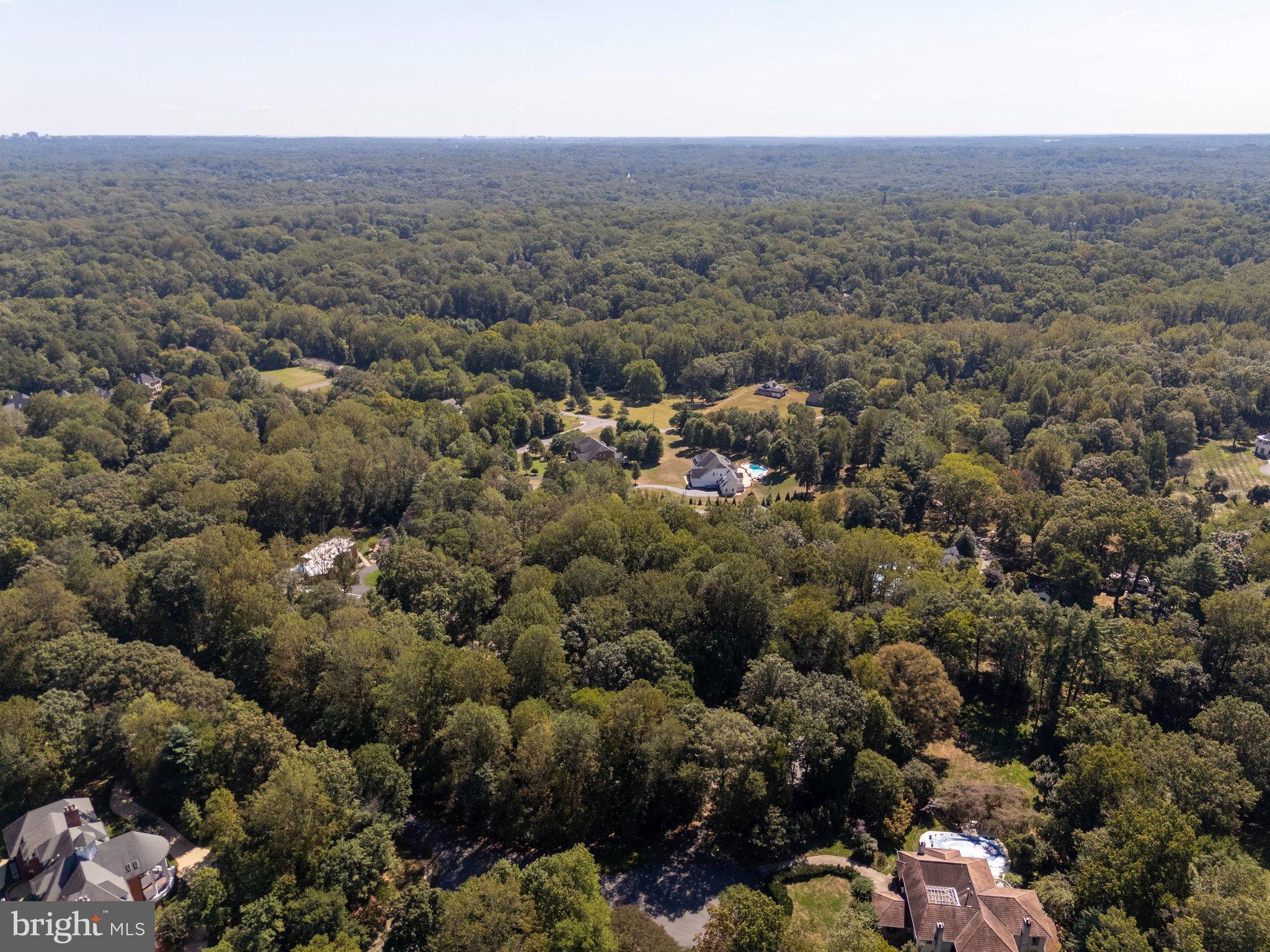 11214 Stuart Mill Road Oakton, VA 22124 - Photo 20 of 26 an aerial view of house with yard and mountain view in back