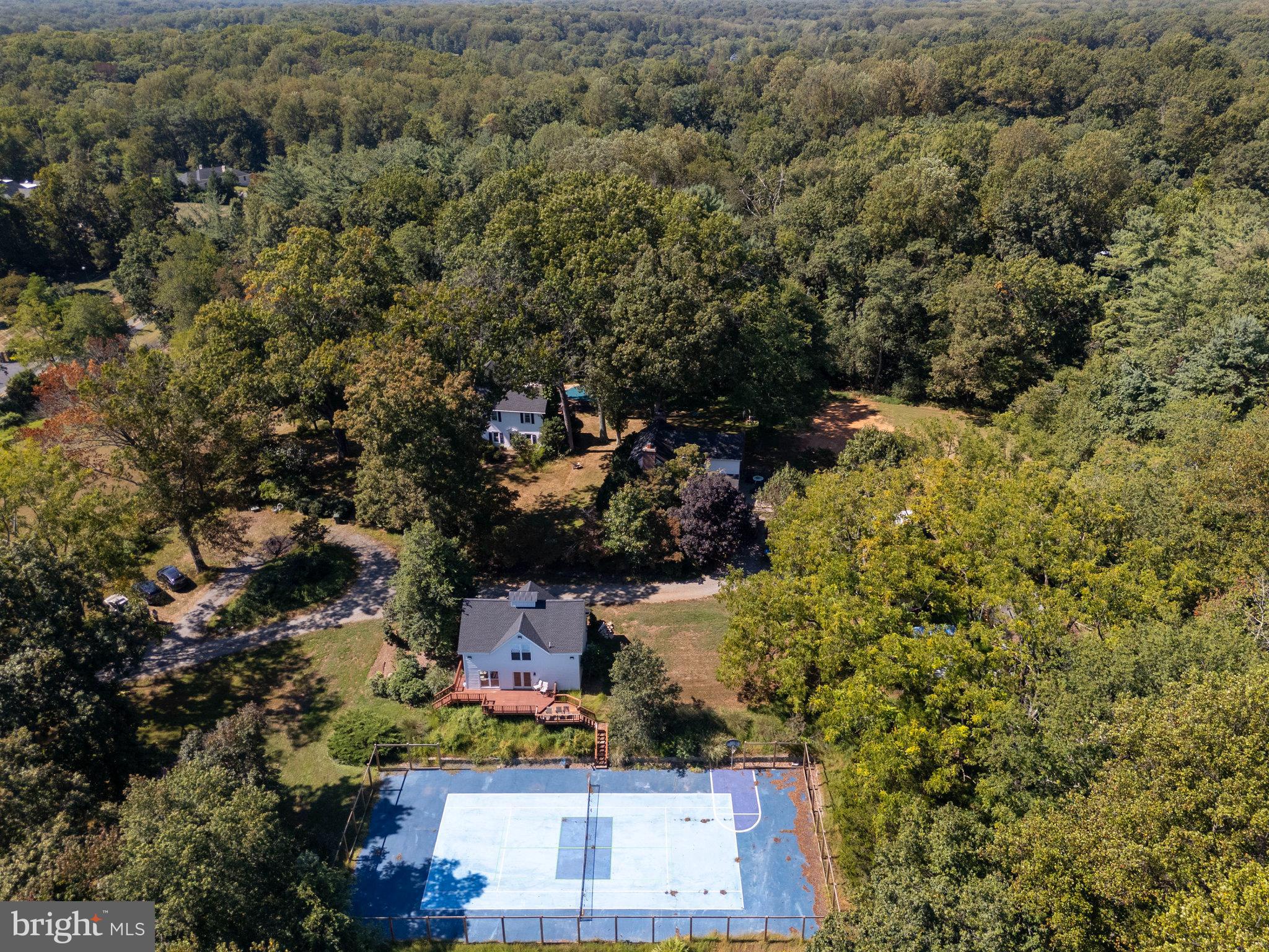 11214 Stuart Mill Road Oakton, VA 22124 - Photo 22 of 26 an aerial view of residential houses with outdoor space