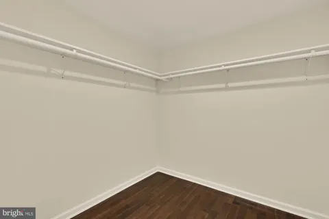 a view of a room with shelf on the wall