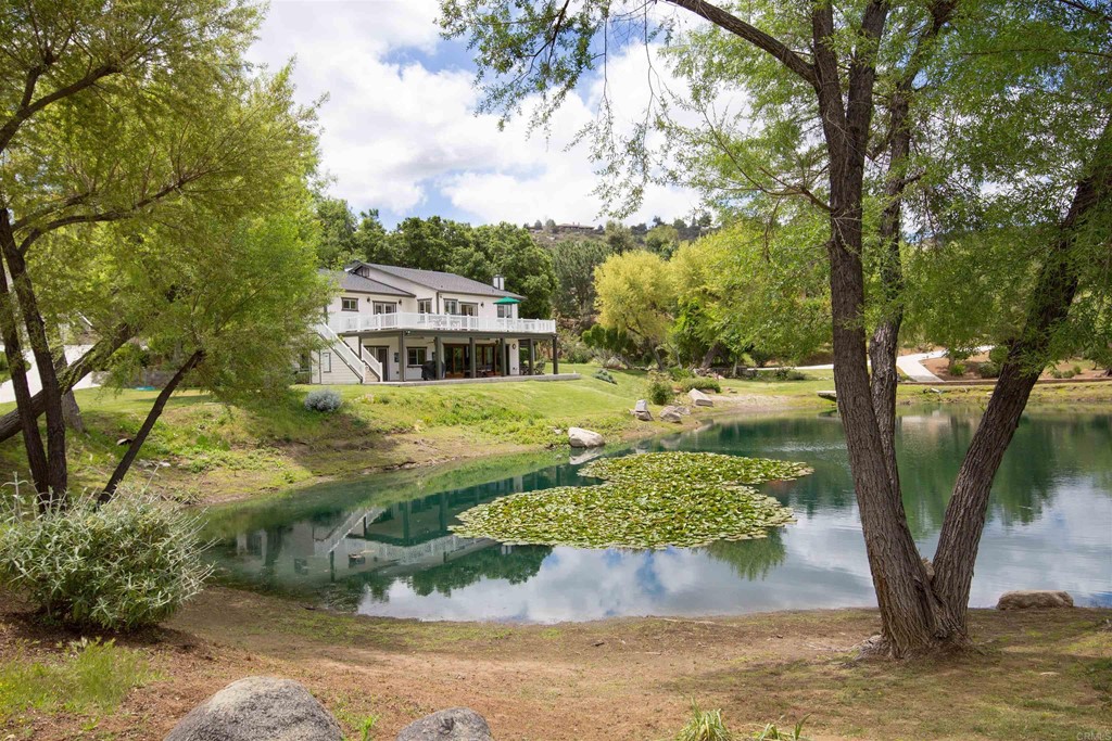 1793 Rocrest Road Alpine, CA 91901 - Photo 14 of 63 a view of a yard with plants and large trees
