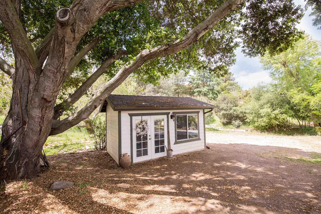 1793 Rocrest Road Alpine, CA 91901 - Photo 16 of 63 a view of a house with a tree in front of it