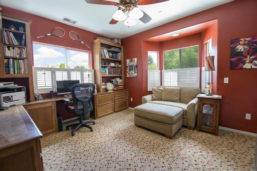 1793 Rocrest Road Alpine, CA 91901 - Photo 35 of 63 a living room with furniture a rug and a large window