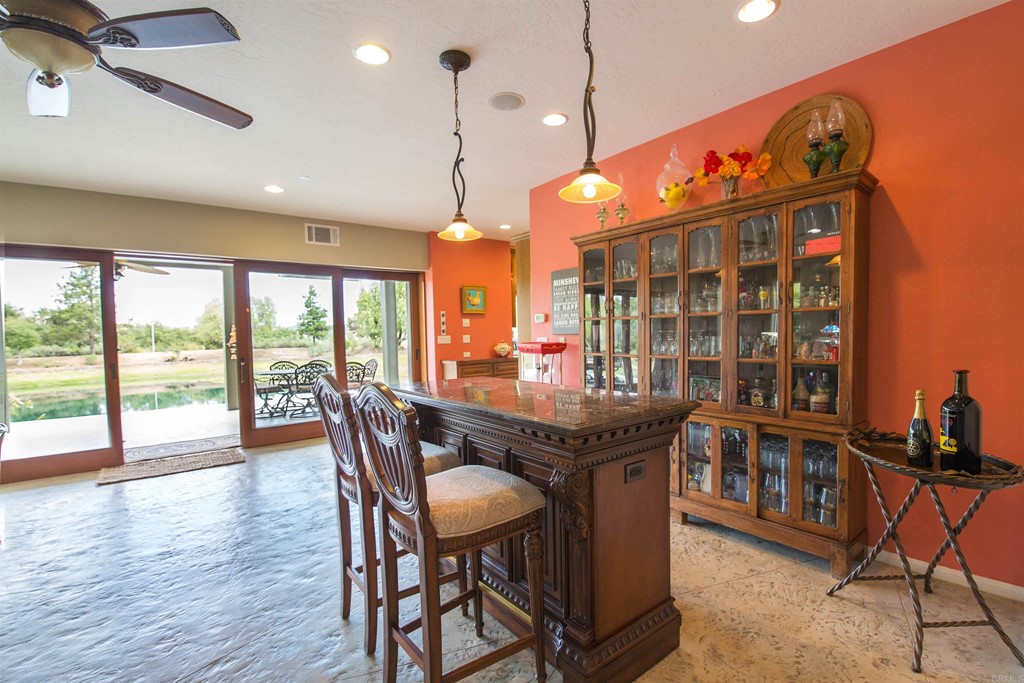 1793 Rocrest Road Alpine, CA 91901 - Photo 41 of 63 a view of a dining room with furniture window and wooden floor