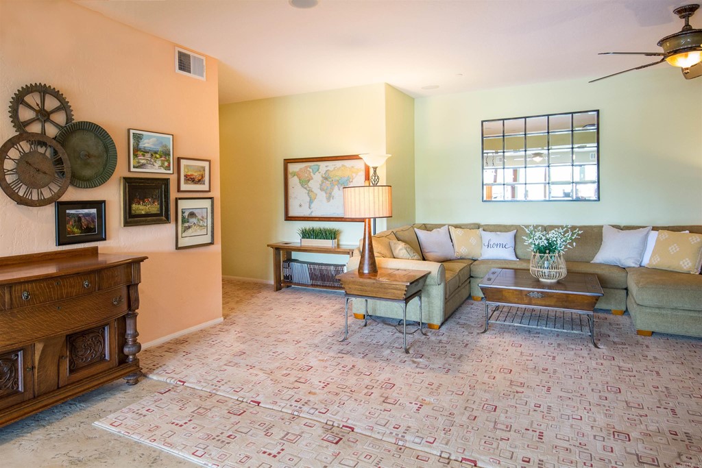 1793 Rocrest Road Alpine, CA 91901 - Photo 45 of 63 a living room with furniture and a fireplace