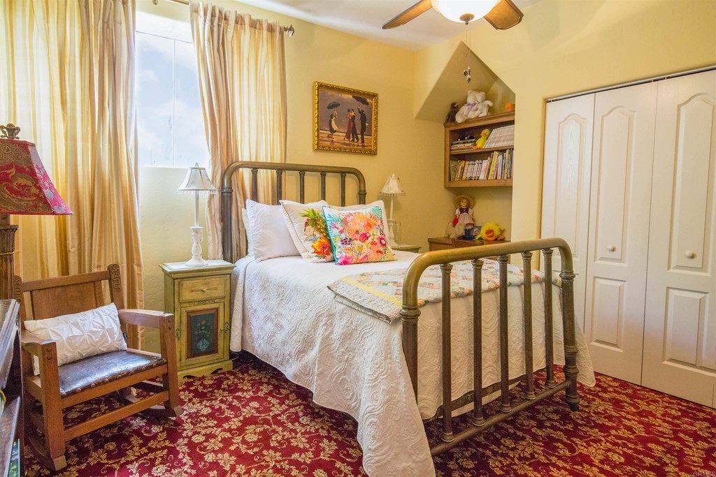 1793 Rocrest Road Alpine, CA 91901 - Photo 47 of 63 a bedroom with a bed and wooden floor