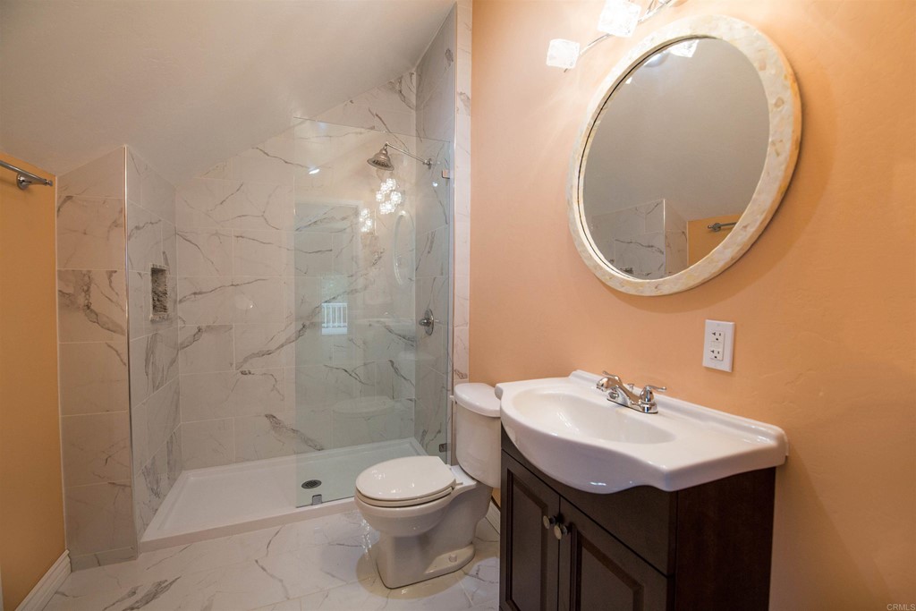 1793 Rocrest Road Alpine, CA 91901 - Photo 60 of 63 a bathroom with a sink a toilet and shower