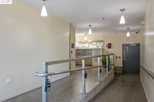 a kitchen with counter top space and refrigerator