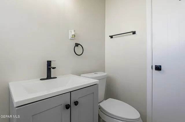 a bathroom with a sink a toilet