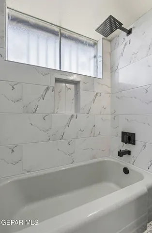 a bathroom with a bathtub