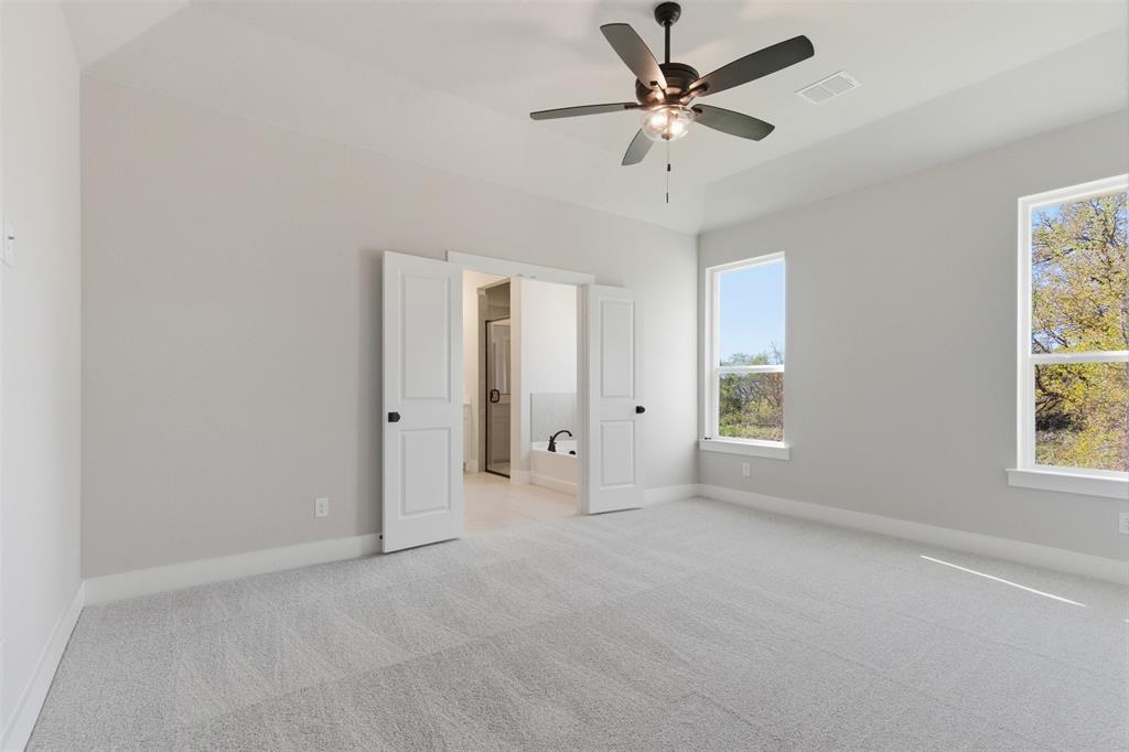 328 Rita Ridge Millsap, TX 76066 - Photo 13 of 27 a view of an empty room with a window