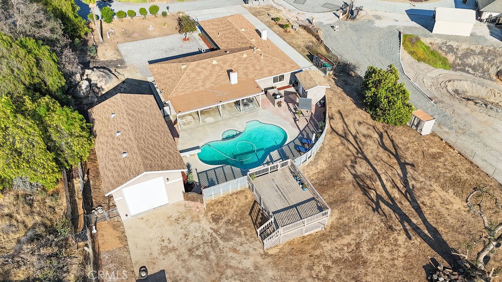 16465 Holcomb Way Riverside, CA 92504 - Photo 48 of 49 an aerial view of a house with a yard and wooden deck
