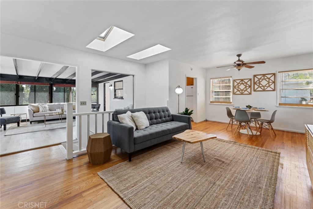 2452 Riverside Place Los Angeles, CA 90039 - Photo 1 of 13 a living room with furniture and a large window