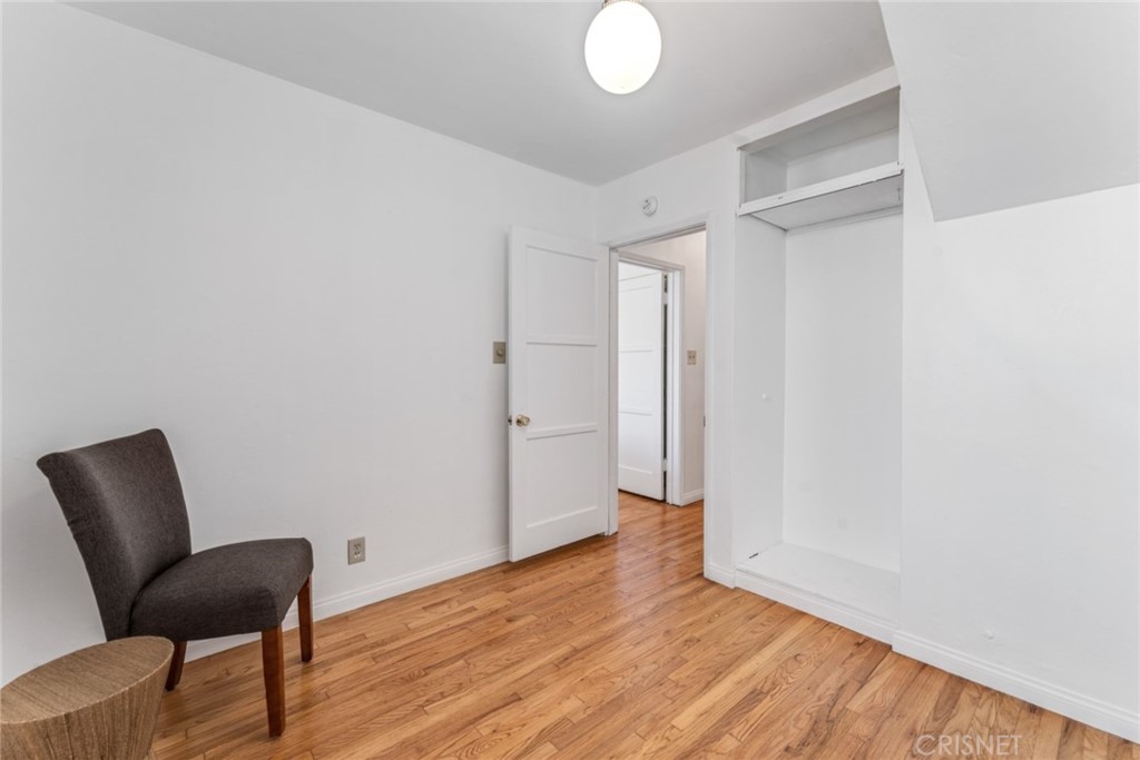 2452 Riverside Place Los Angeles, CA 90039 - Photo 11 of 13 a view of a livingroom with wooden floor and a workspace