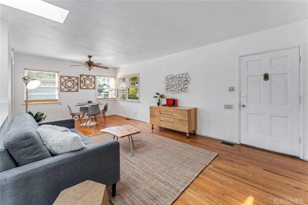 2452 Riverside Place Los Angeles, CA 90039 - Photo 2 of 13 a living room with furniture and wooden floor