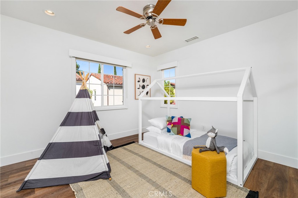 140 White Flower Irvine, CA 92603 - Photo 19 of 44 a living room with furniture and a rug
