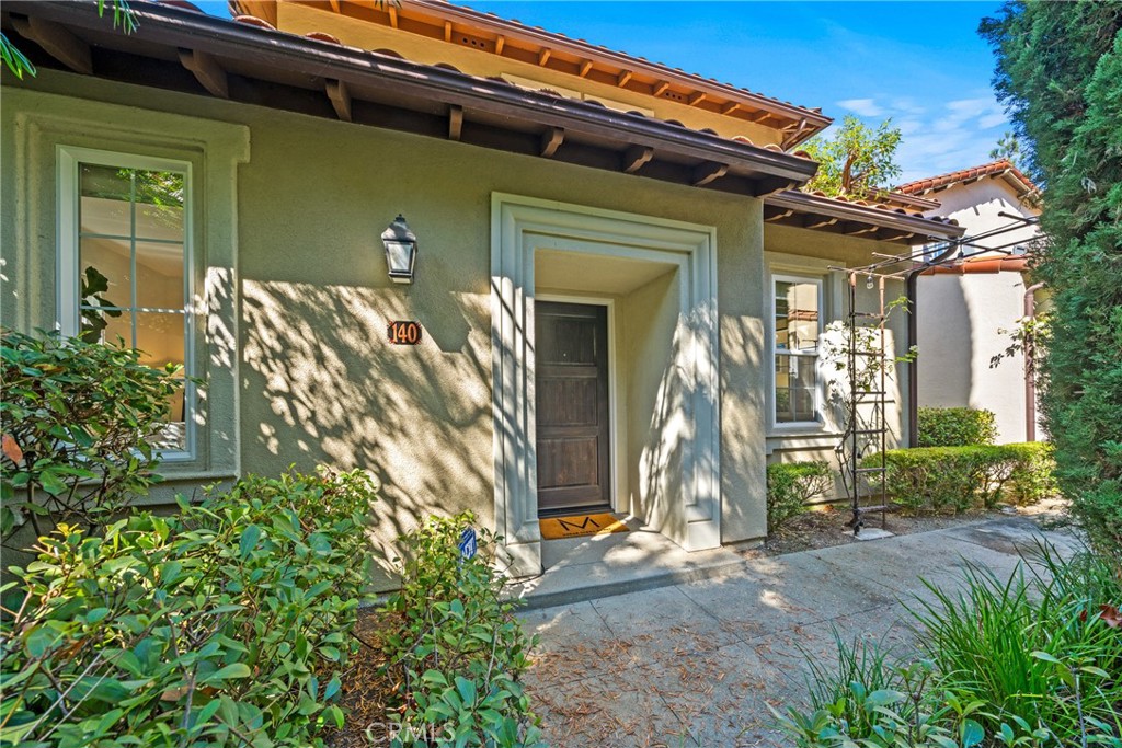 140 White Flower Irvine, CA 92603 - Photo 29 of 44 a view of a house with a small yard and plants