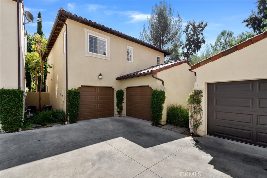 140 White Flower Irvine, CA 92603 - Photo 31 of 44 a view of a house with a garage