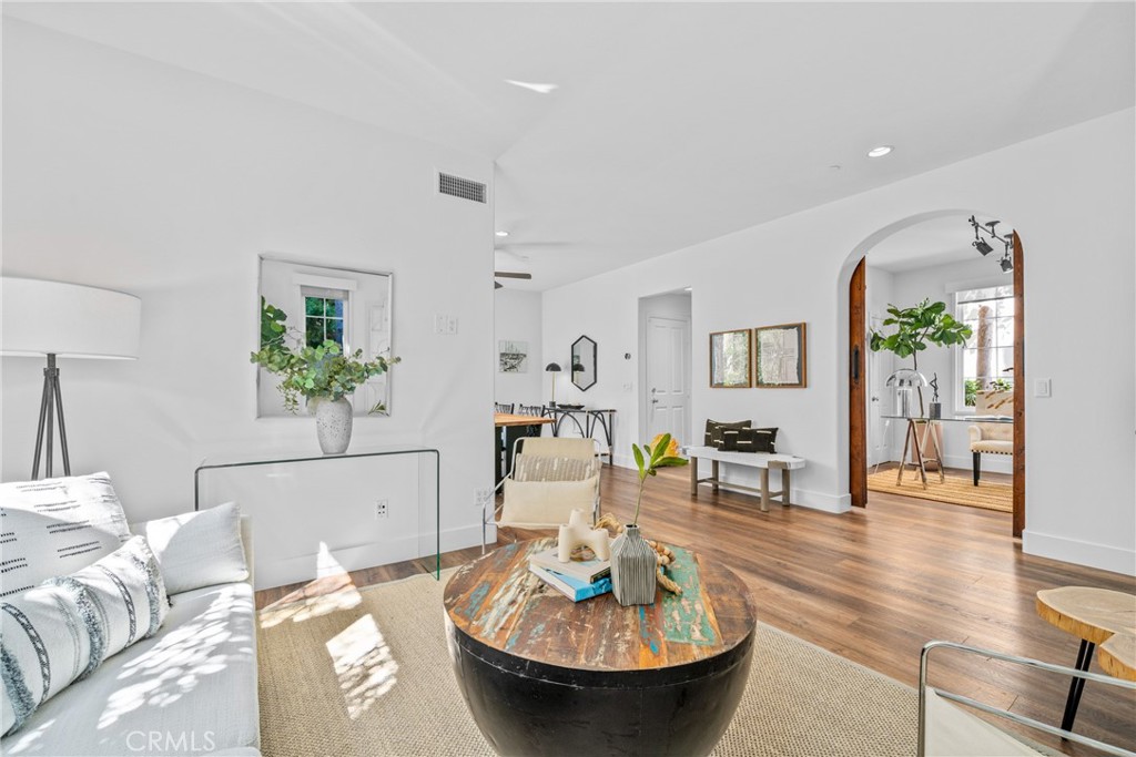 140 White Flower Irvine, CA 92603 - Photo 4 of 44 a living room with furniture and a table