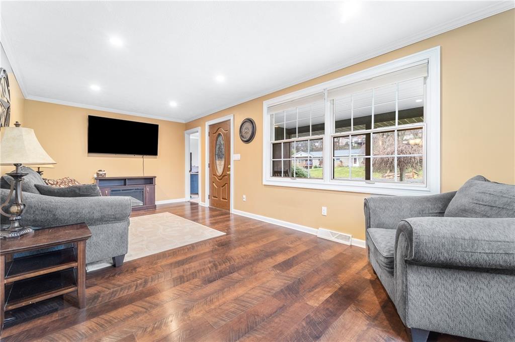 37 Wilson Avenue Cecil, PA 15321 - Photo 4 of 30 Bright living space with hardwood floors, recessed lighting, and a large picture window for natural light.