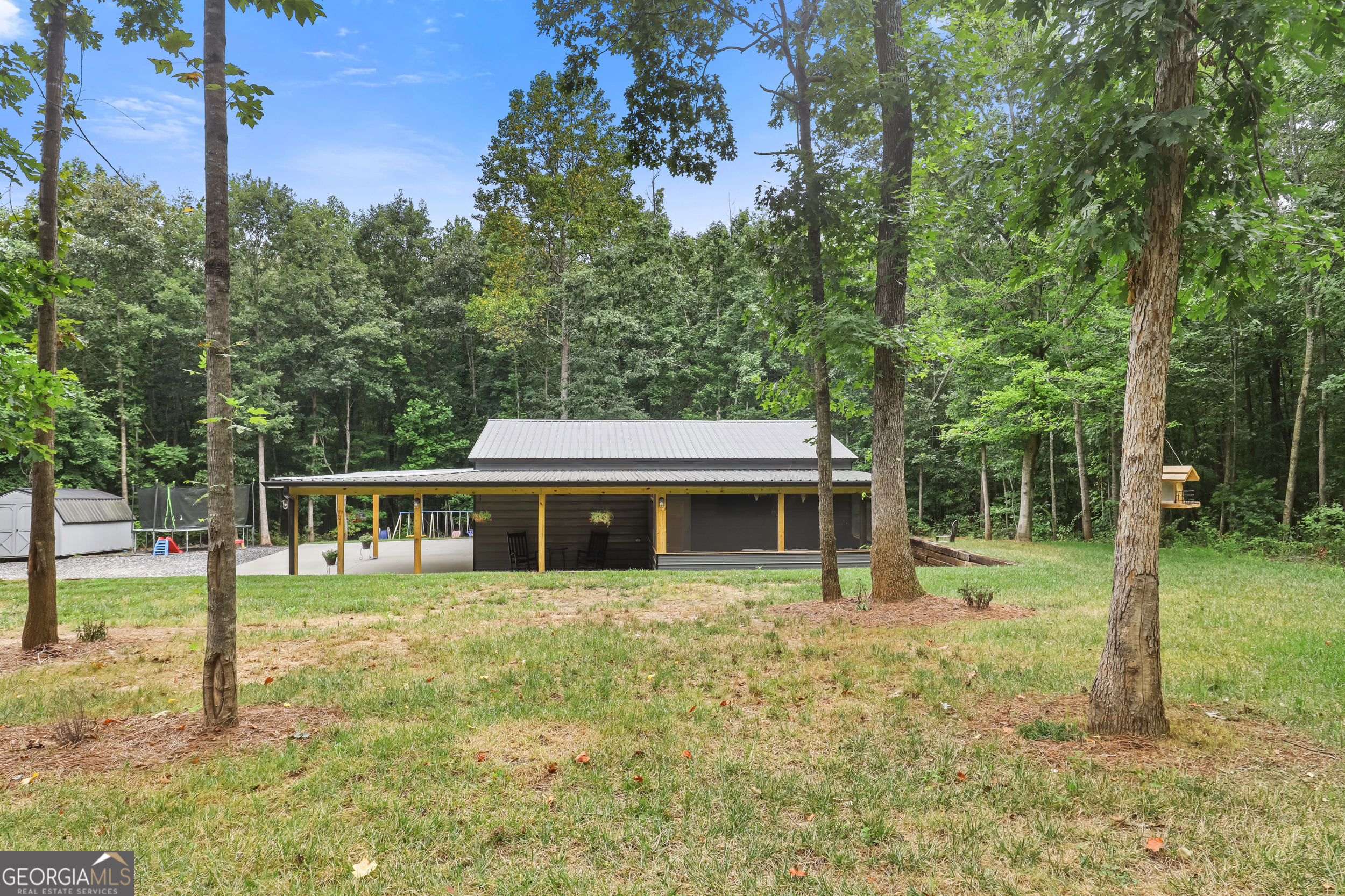 373 Fairview School Road Demorest, GA 30535 - Photo 1 of 1 a view of a house with backyard and a tree