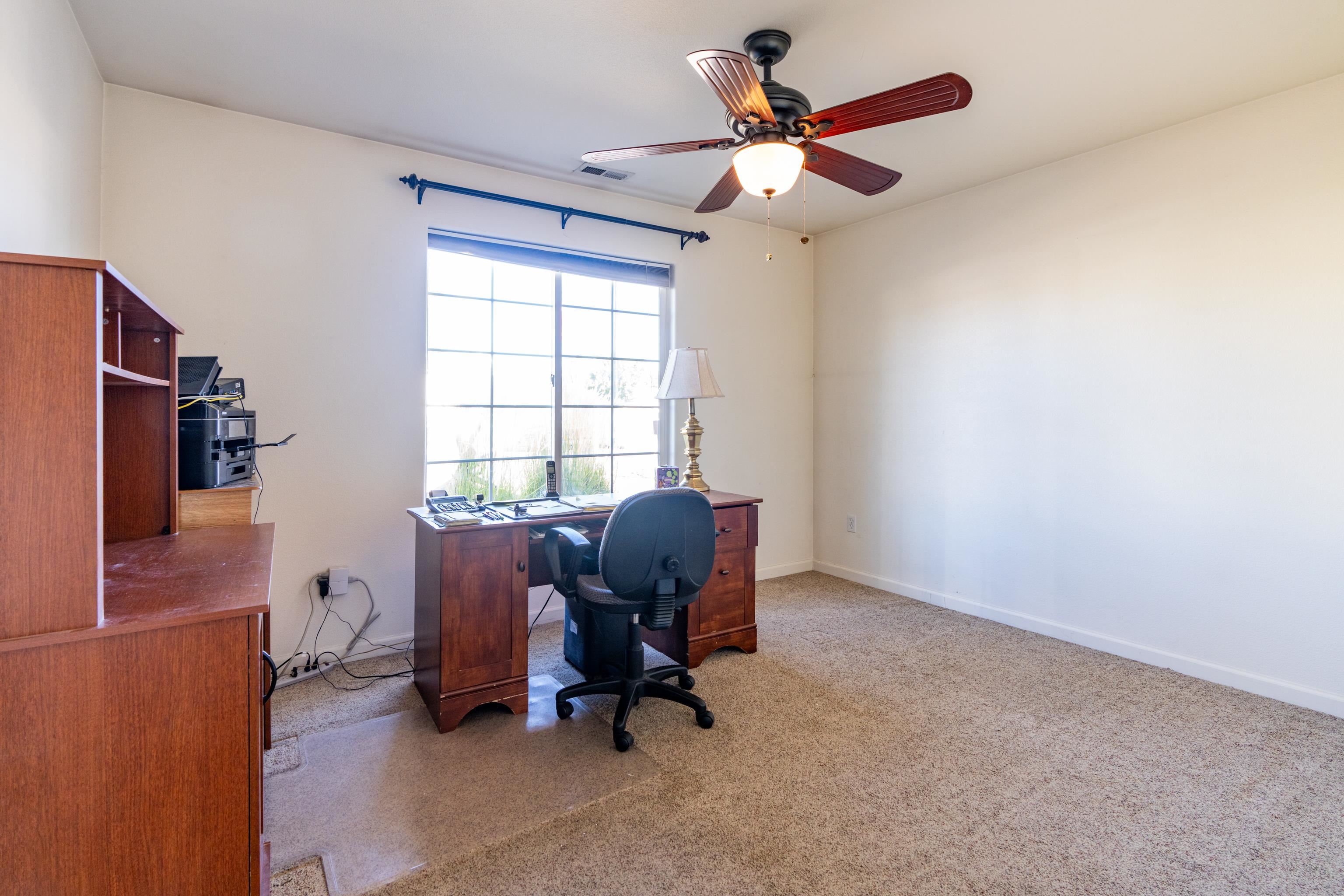 653 Hall Street Fruita, CO 81521 - Photo 11 of 25 a view of workspace with windows
