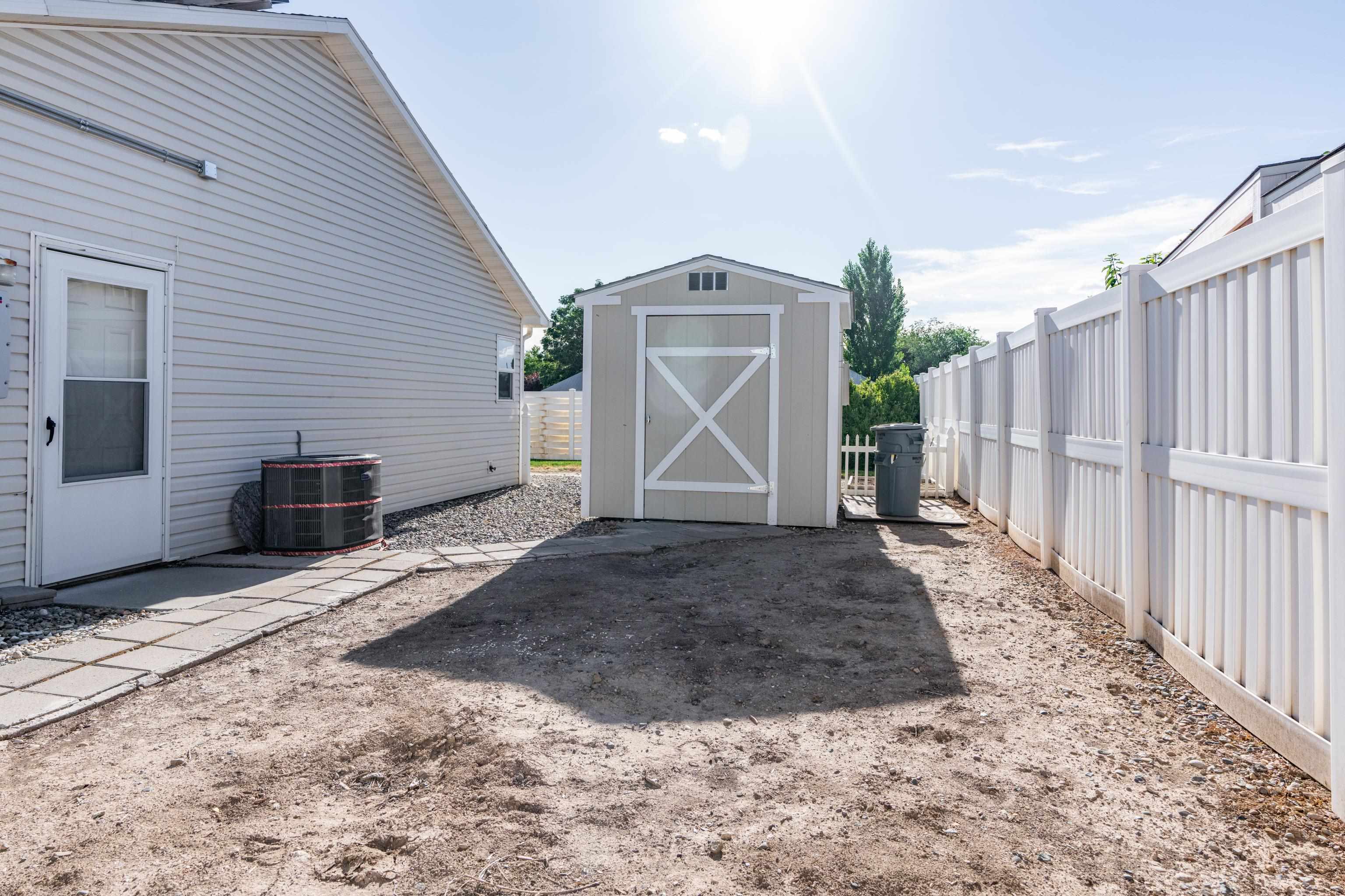 653 Hall Street Fruita, CO 81521 - Photo 23 of 25 a view of a backyard