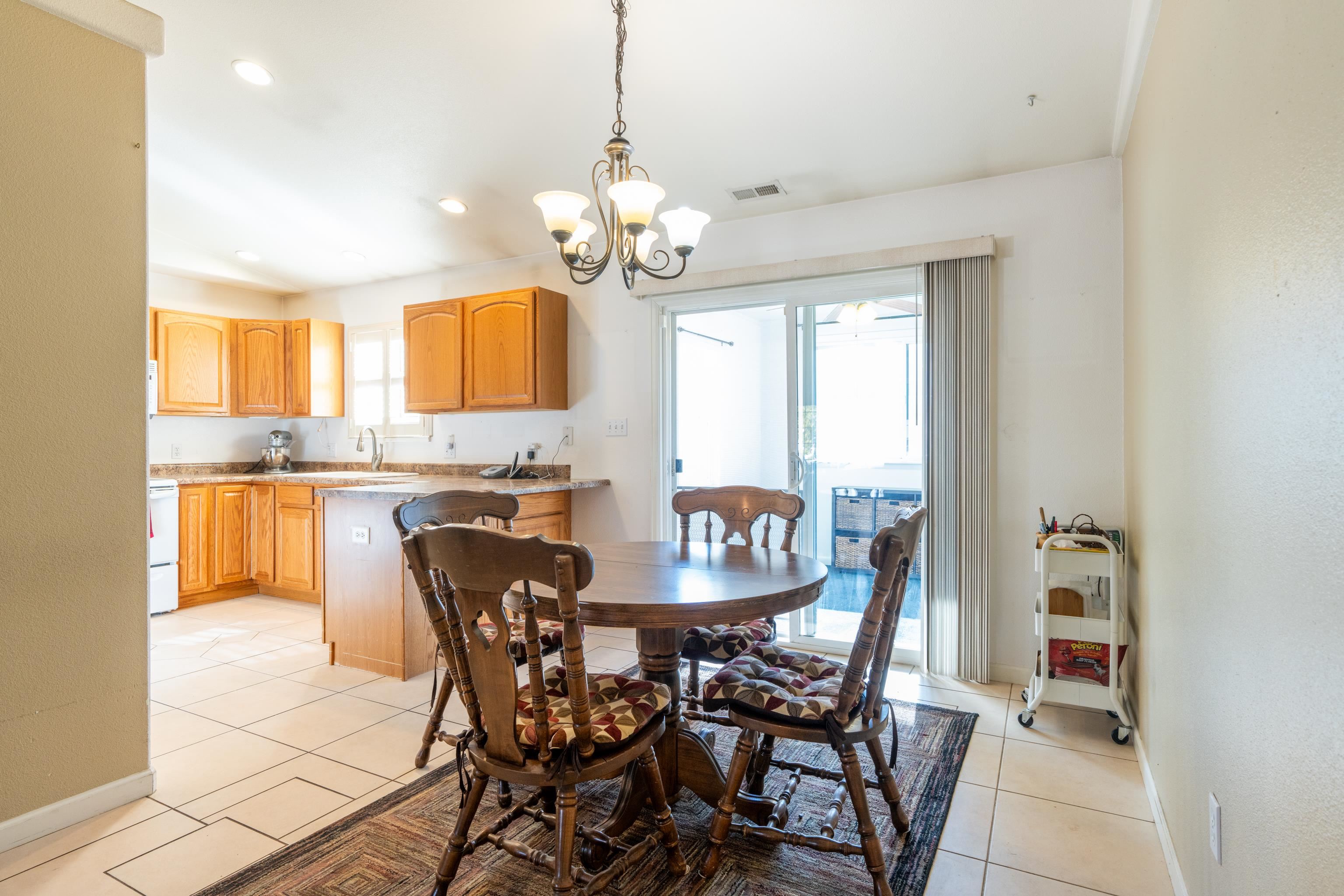 653 Hall Street Fruita, CO 81521 - Photo 6 of 25 a view of a dining room with furniture window and outside view
