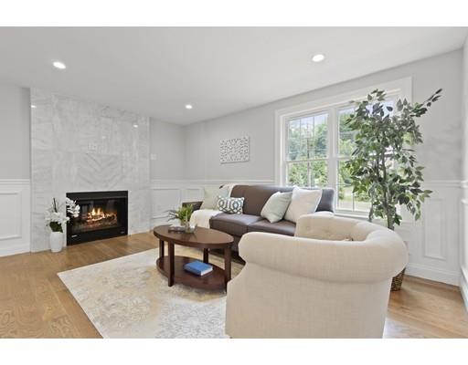 2 Raynor Road Weston, MA 02493 - Photo 12 of 26 a living room with furniture and a fireplace