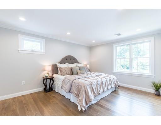 2 Raynor Road Weston, MA 02493 - Photo 16 of 26 a bedroom with two beds and a window