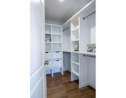 2 Raynor Road Weston, MA 02493 - Photo 18 of 26 a room with cabinets and wooden floor