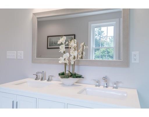 2 Raynor Road Weston, MA 02493 - Photo 20 of 26 a bathroom with a sink vanity and a mirror