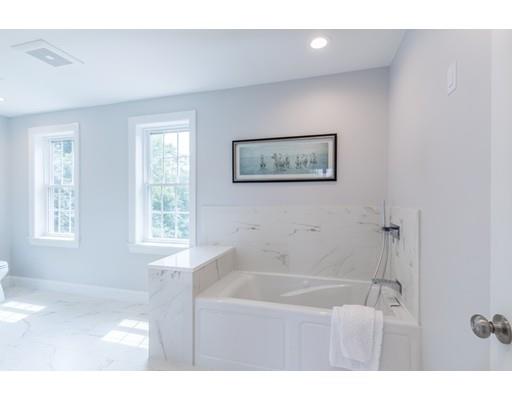 2 Raynor Road Weston, MA 02493 - Photo 21 of 26 a bathroom with a tub shower and a sink