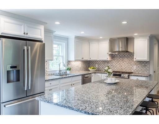 2 Raynor Road Weston, MA 02493 - Photo 10 of 26 a kitchen with granite countertop a refrigerator and a stove top oven