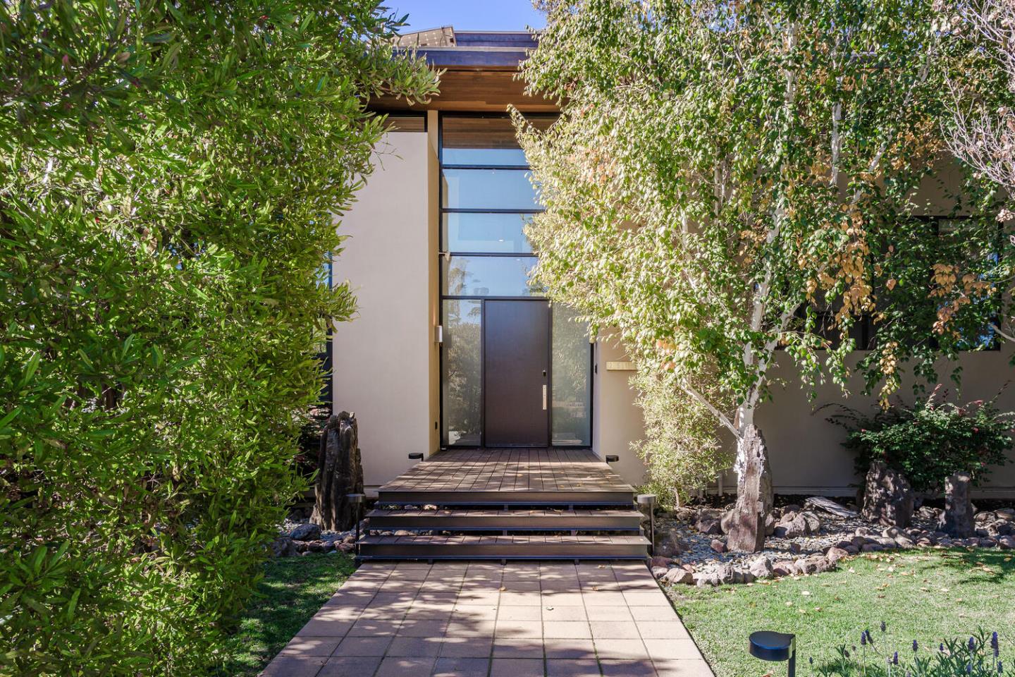 2510 Skyfarm Drive Hillsborough, CA 94010 - Photo 1 of 66 a front view of a house with a garden