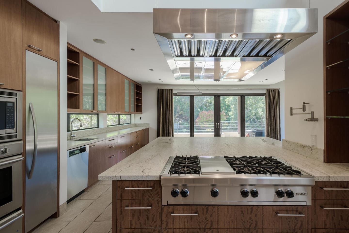 2510 Skyfarm Drive Hillsborough, CA 94010 - Photo 12 of 66 a kitchen with stainless steel appliances granite countertop a stove a refrigerator and a sink