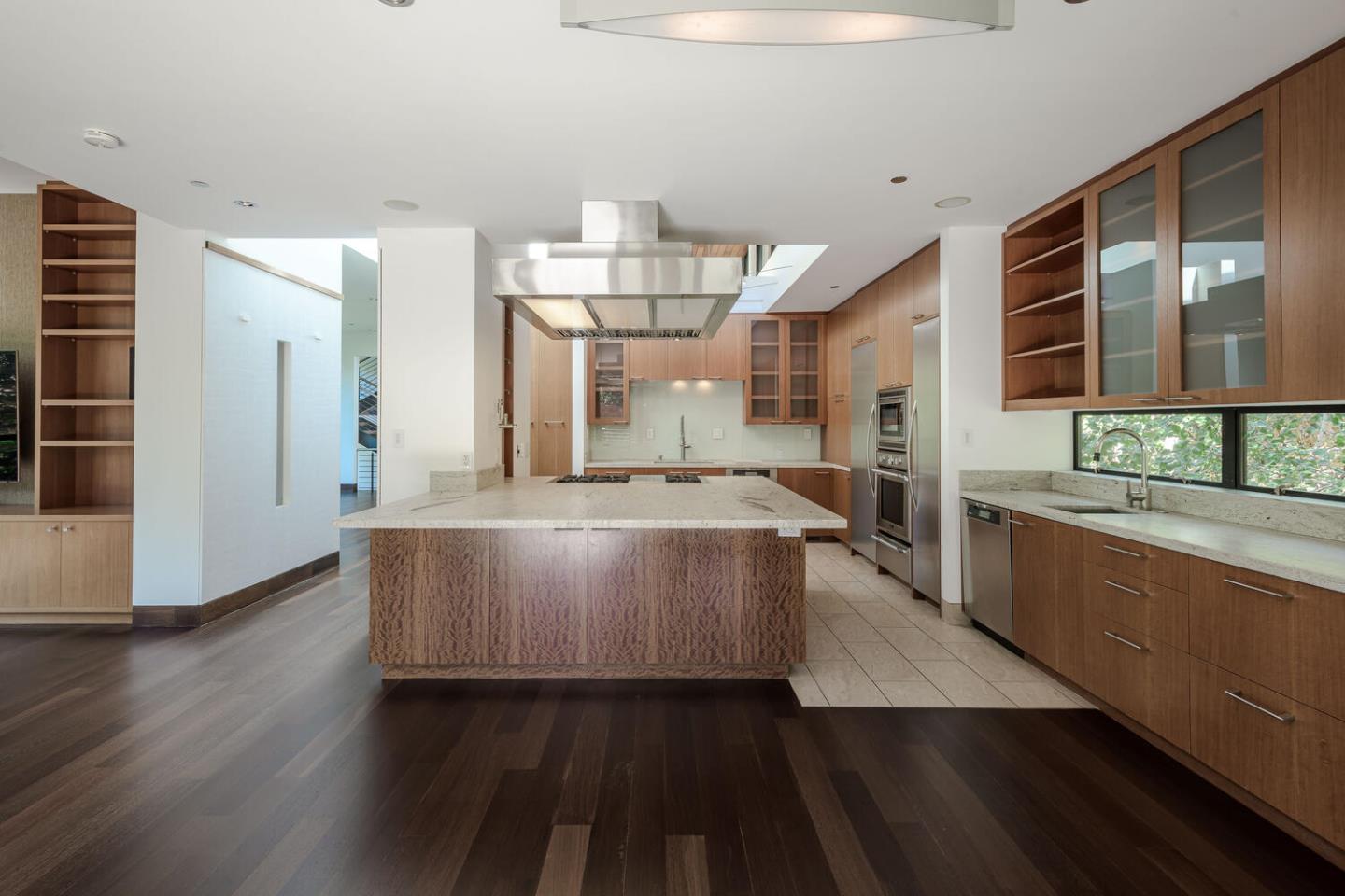 2510 Skyfarm Drive Hillsborough, CA 94010 - Photo 14 of 66 a large kitchen with stainless steel appliances wooden floors and large window