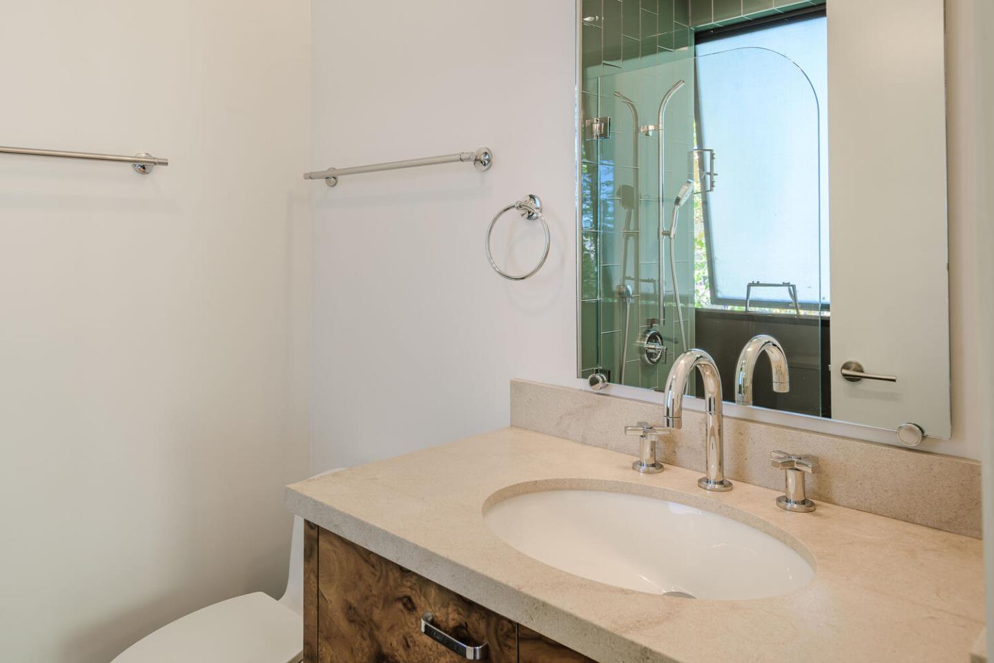2510 Skyfarm Drive Hillsborough, CA 94010 - Photo 25 of 66 a bathroom with a granite countertop sink toilet and a mirror