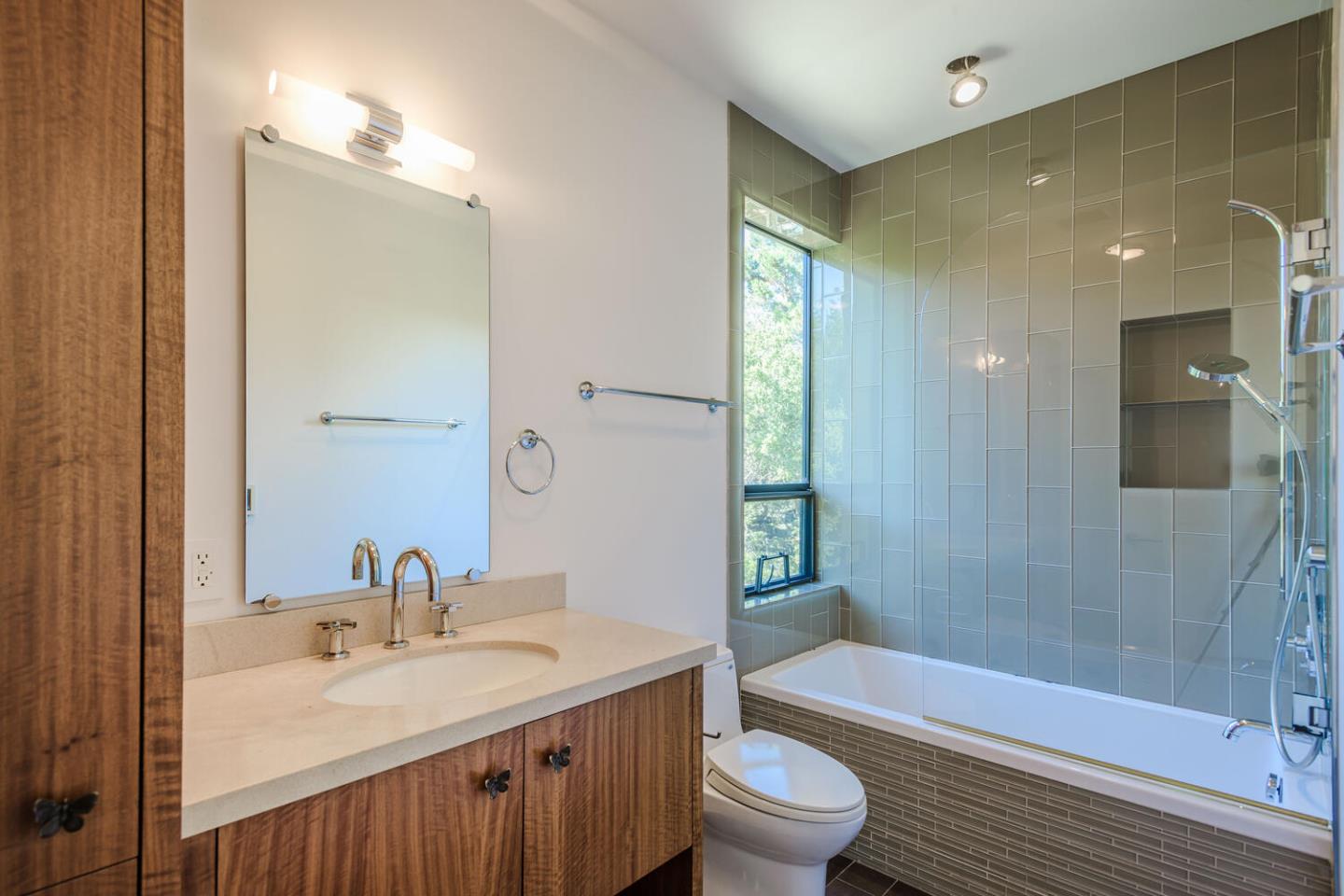 2510 Skyfarm Drive Hillsborough, CA 94010 - Photo 28 of 66 a bathroom with a sink a toilet and shower