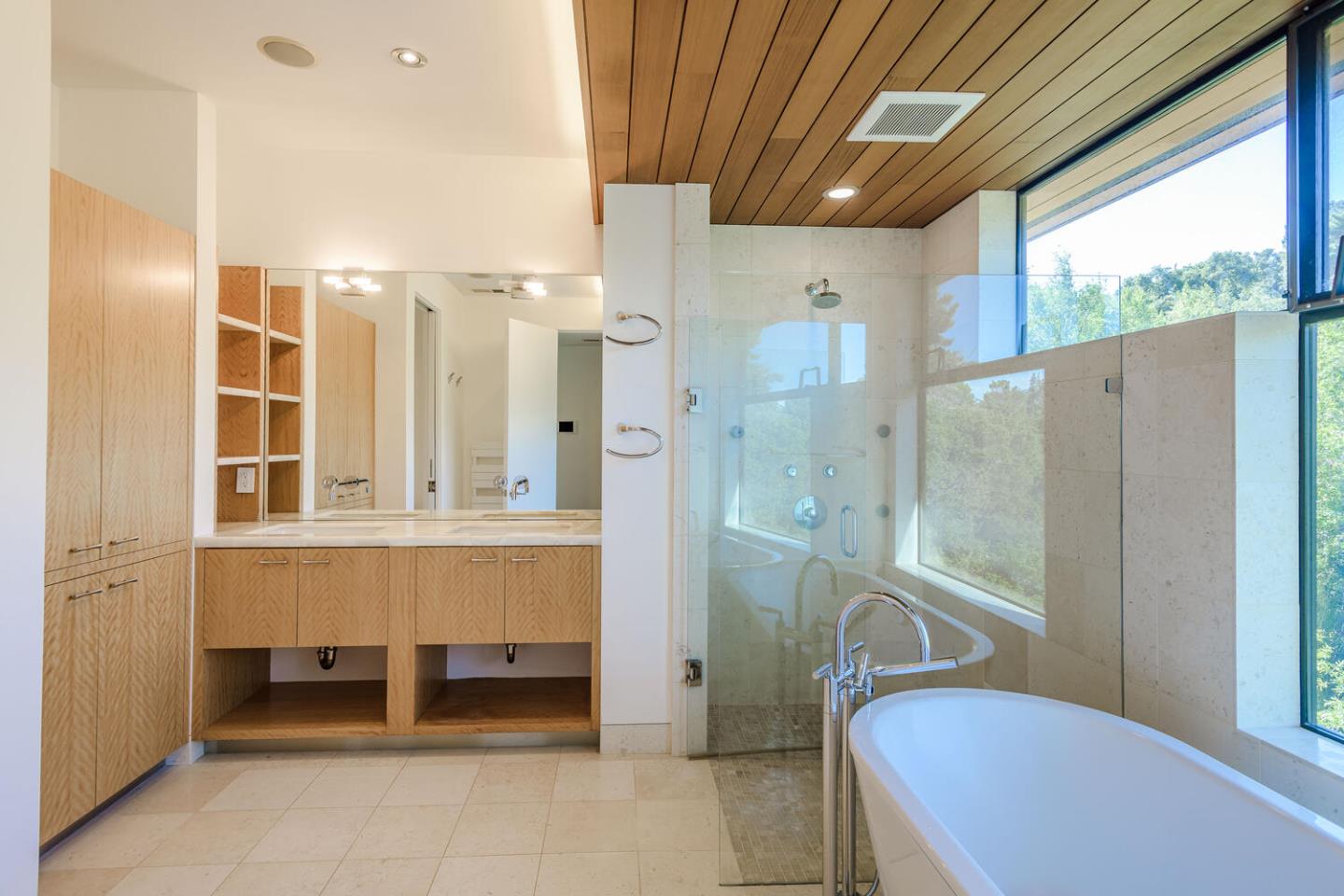 2510 Skyfarm Drive Hillsborough, CA 94010 - Photo 35 of 66 a bathroom with a tub shower and sink