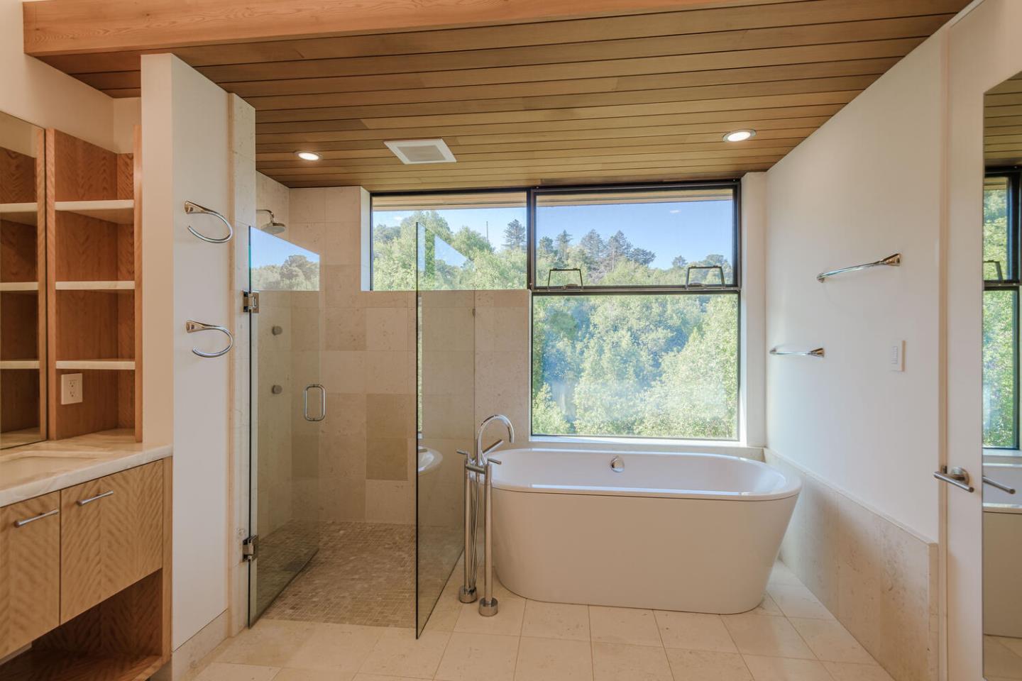 2510 Skyfarm Drive Hillsborough, CA 94010 - Photo 36 of 66 a bathroom with a tub and shower