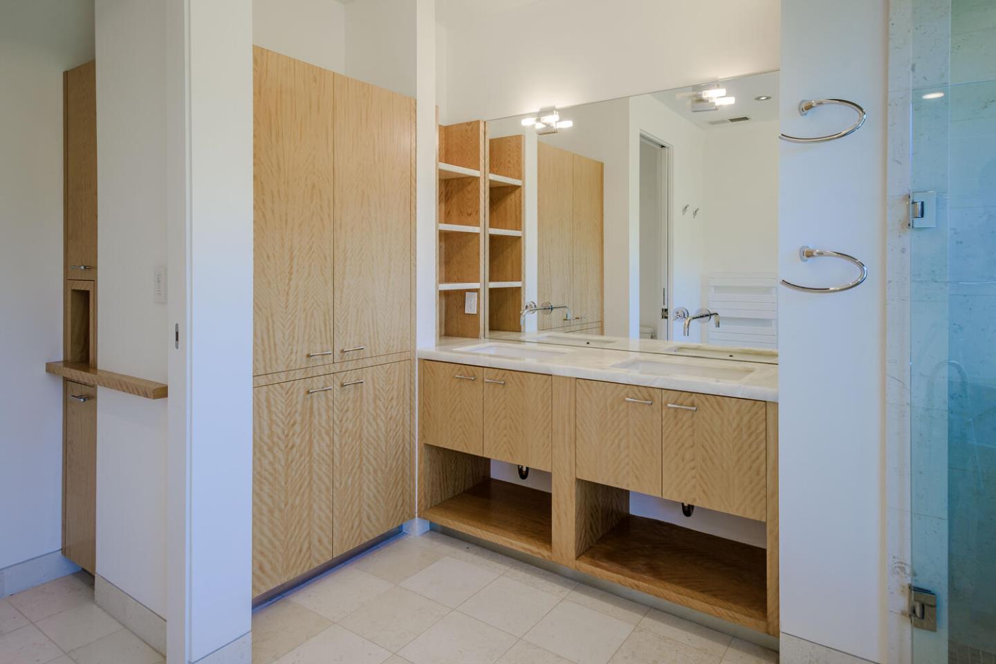 2510 Skyfarm Drive Hillsborough, CA 94010 - Photo 37 of 66 a bathroom with a double vanity sink and a mirror