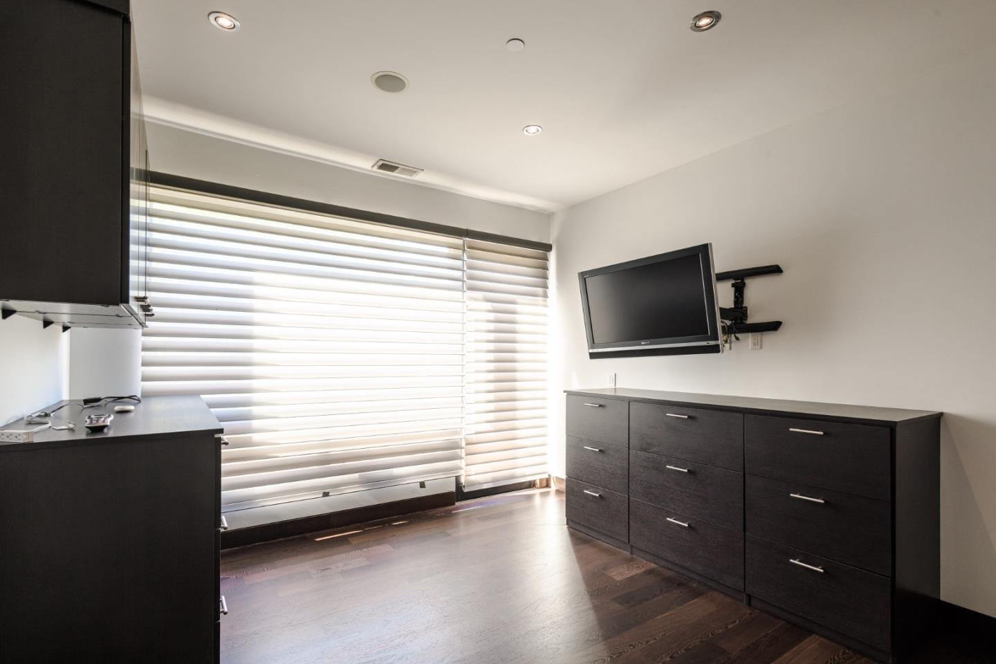 2510 Skyfarm Drive Hillsborough, CA 94010 - Photo 49 of 66 a view of a livingroom with a flat screen tv